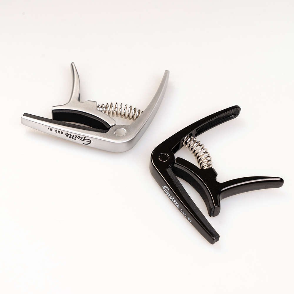 GUITTO GGC-07 Ukulele Capo Qui - đánh giá và giá Musical Instrument Art